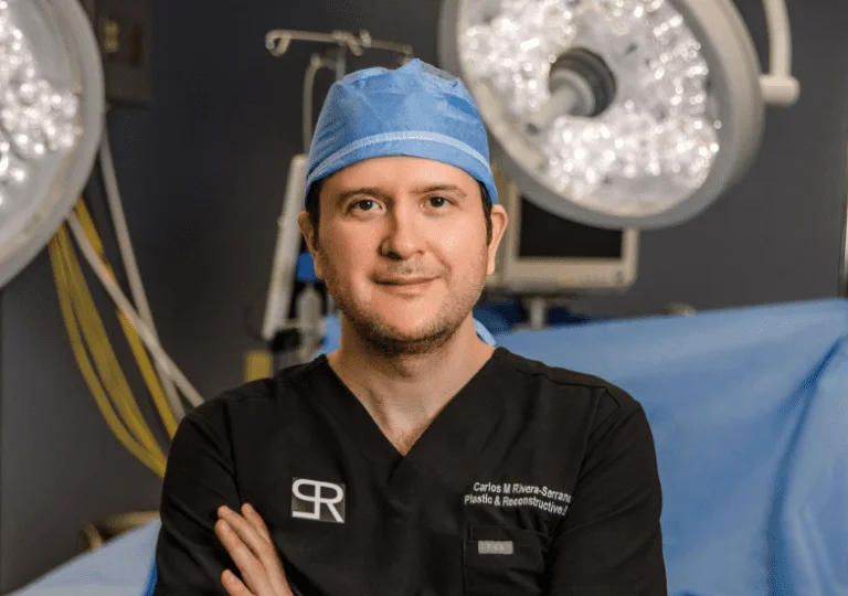 Dr. Rivera posing in his surgery center